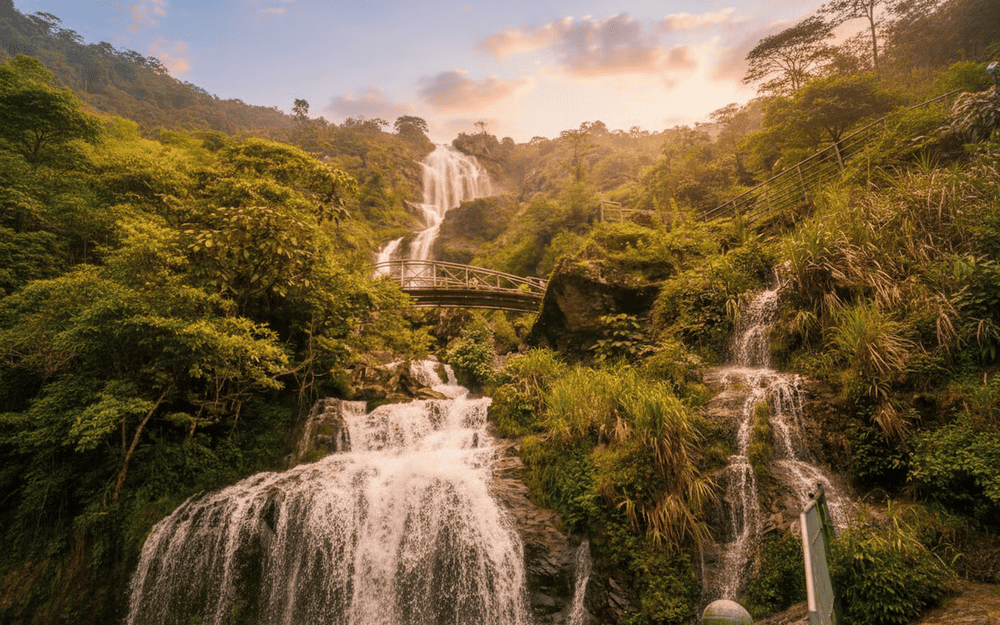 Silver Waterfall cascades 200 meters down rocky cliffs, creating a spectacular natural attraction that's easily accessible from Sapa town center
